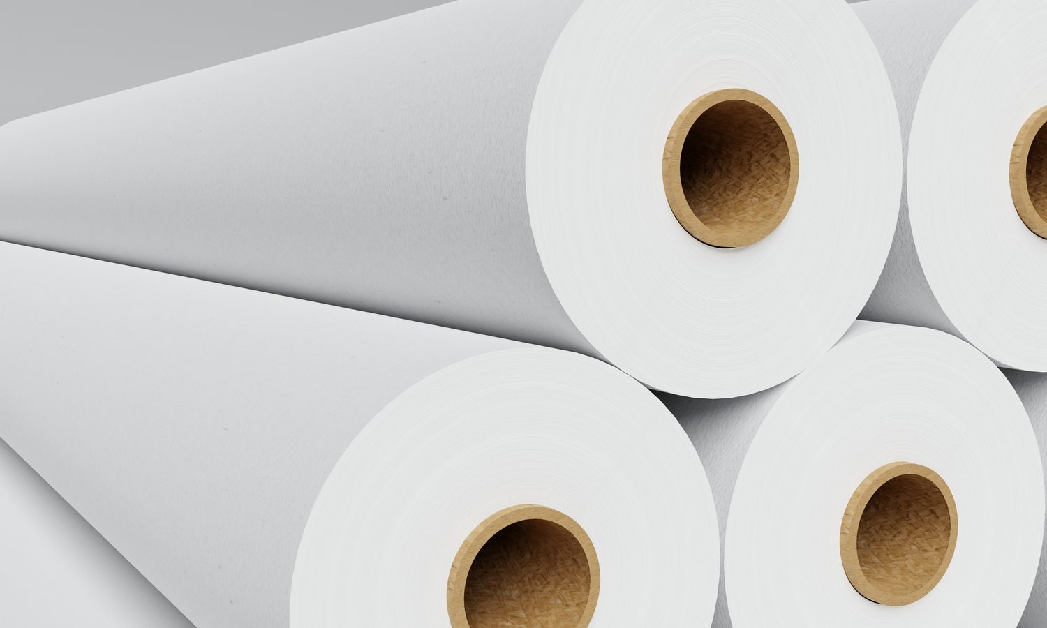 White paper rolls stored in an industrial factory